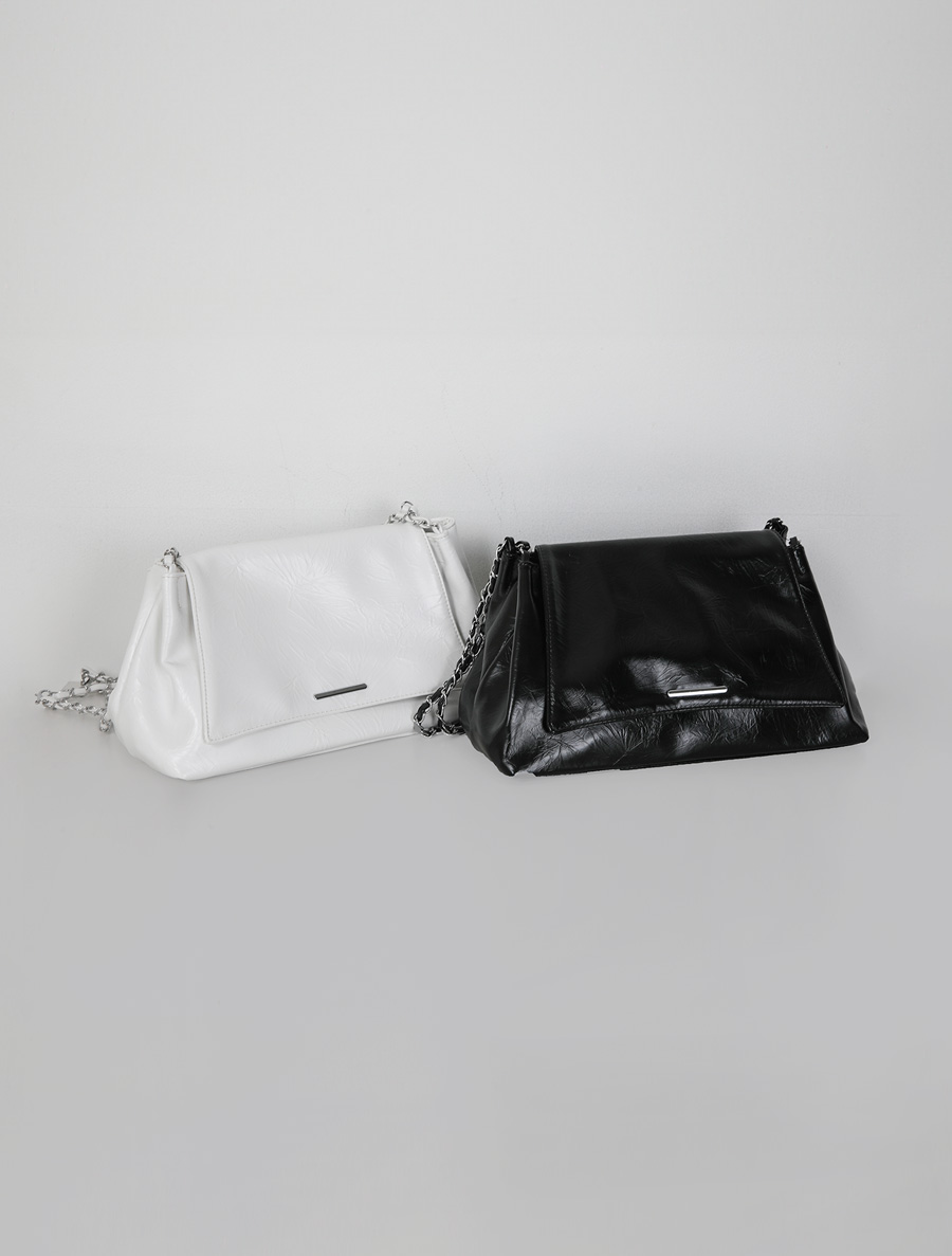 Jeslin 皮革斜背包